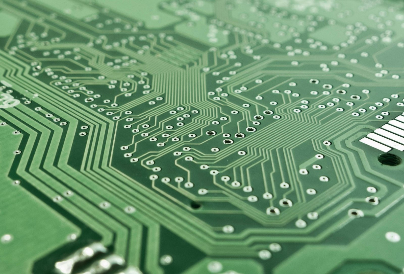 Technician assembling green tech hardware
